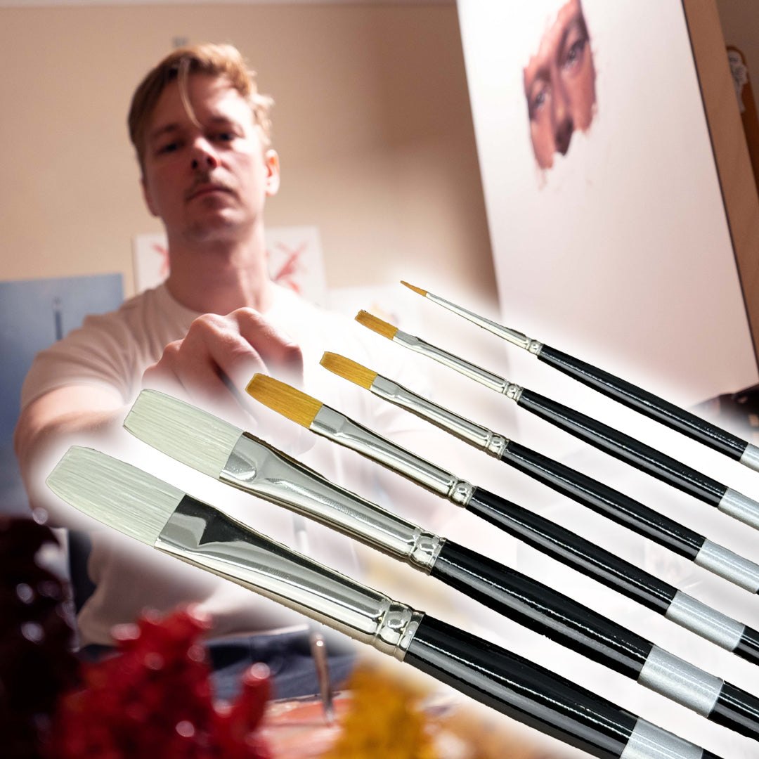 A Trekell artist holding a fan of paint brushes in front of a canvas